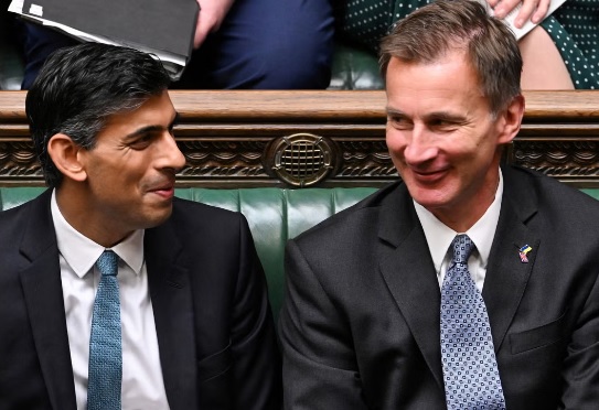 What is the concept of stealth tax and why is Rishi Sunak delaying its implementation?